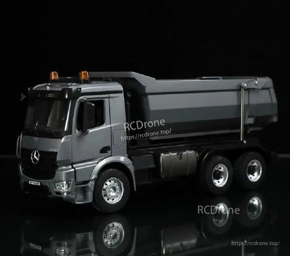 Mercedes-Benz truck with detailed design and reflective surface.