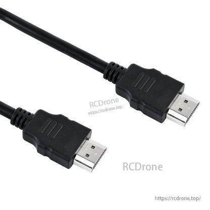 Close-up of two HDMI male connectors on black cable, showing molded grips and pins