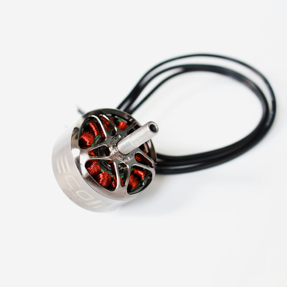 Angled top view showing motor bell vents, copper windings, and prop shaft