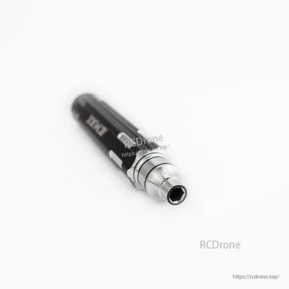 Close-up of the EMAX screwdriver hex socket opening and metal collar at the tip