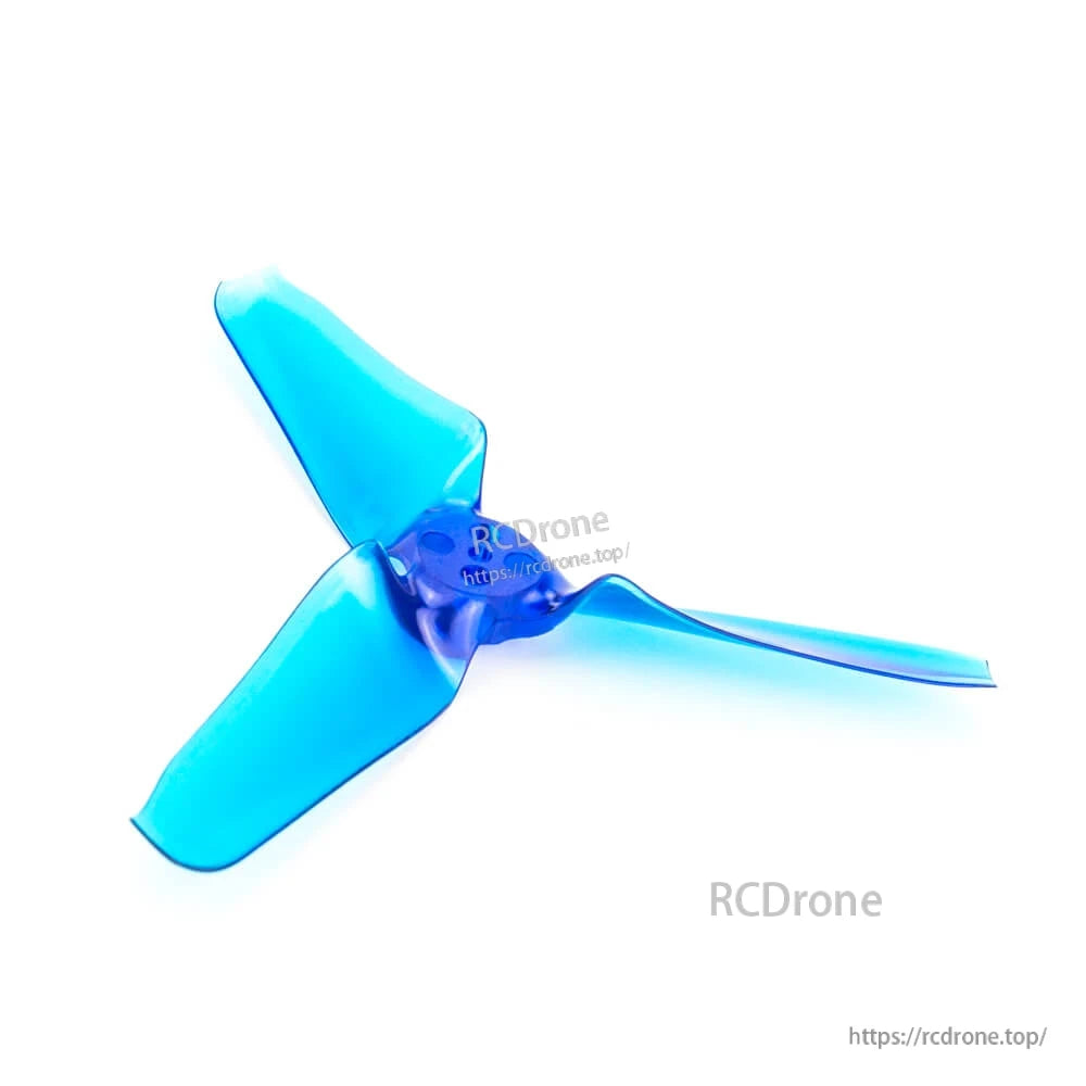 Single translucent blue tri-blade propeller close-up showing hub holes and blade shape