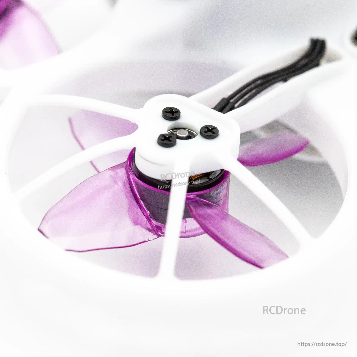 Installed prop close-up on ducted micro drone motor, showing screws and prop clearance