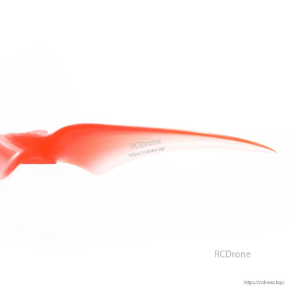 Side profile of a single propeller blade showing airfoil curve and thin tapered tip
