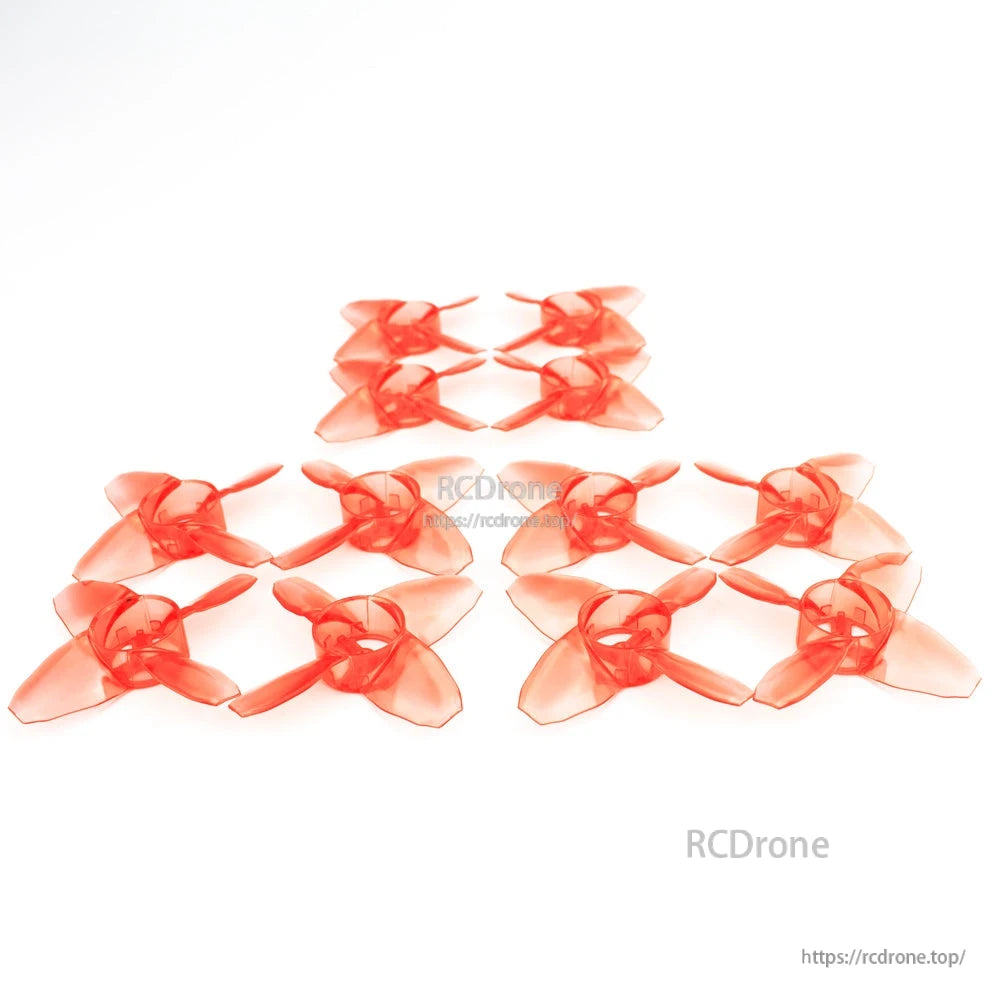 EMAX Avan Tinyhawk TH Turtlemode Propeller bundle laid out on white background, multiple red 4-blade props