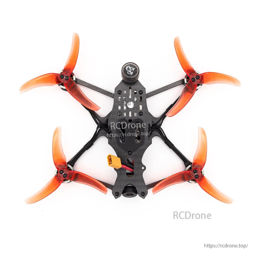 Top-down view of micro quadcopter frame layout with orange props and antenna at rear