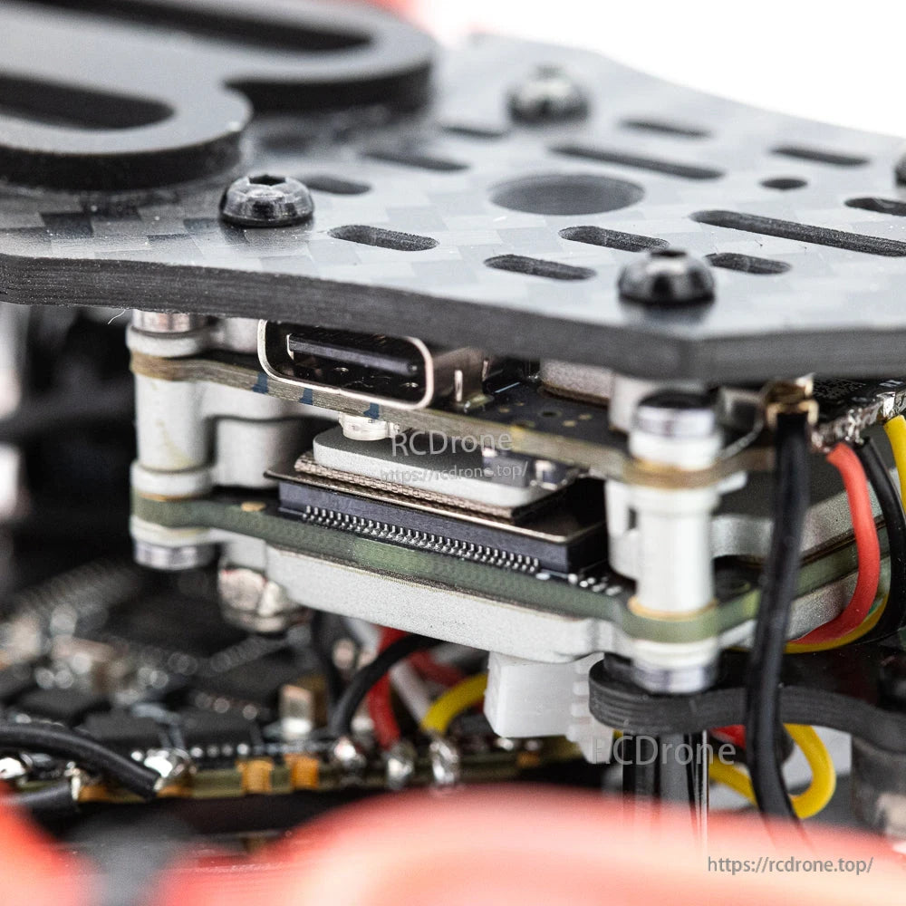 USB-C port close-up on FPV digital unit stack under the top plate