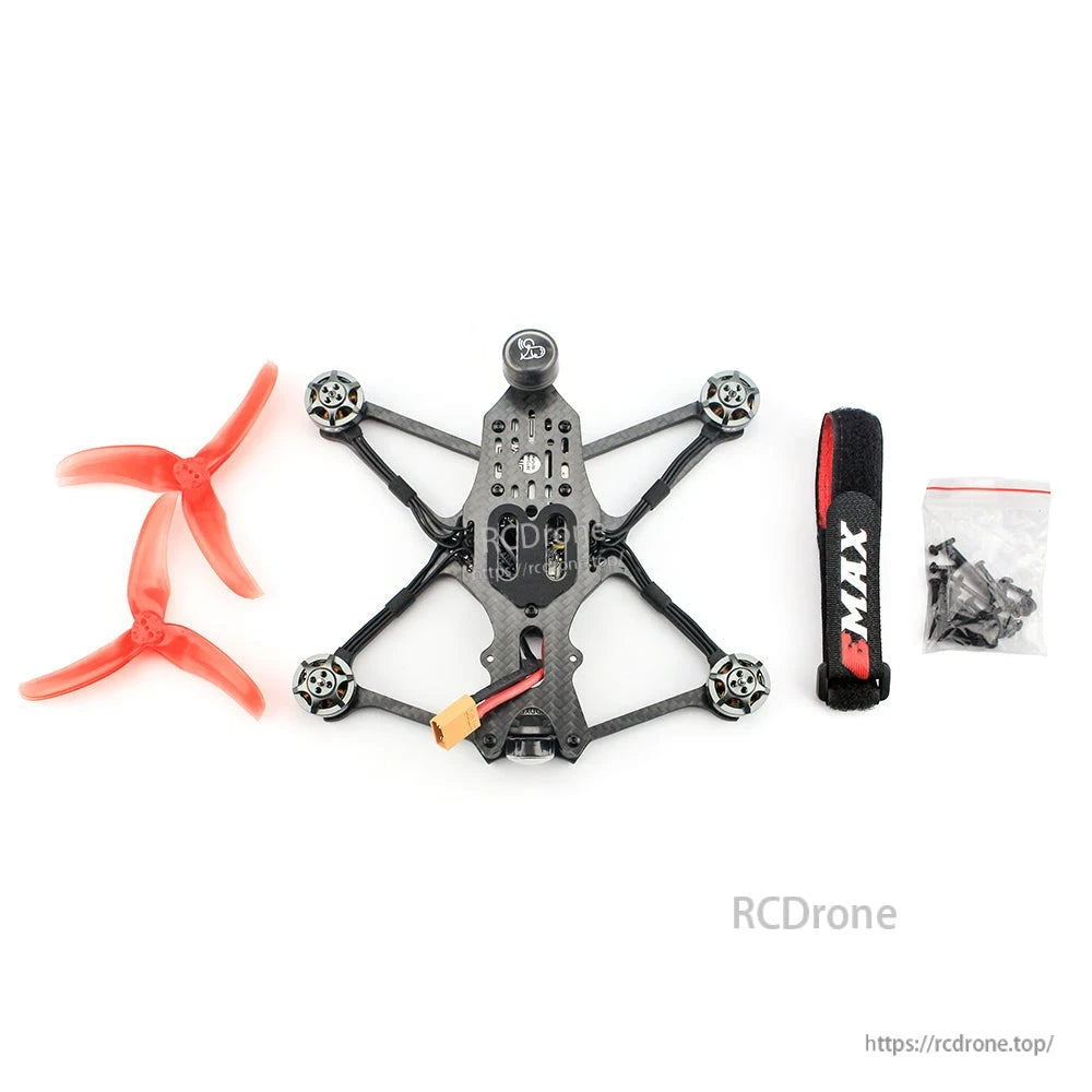 In-the-box accessories: spare propellers, battery strap, and screw set alongside the quad