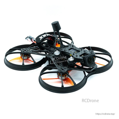 Angled side view of ducted FPV drone showing front camera mount, antenna mast, and frame