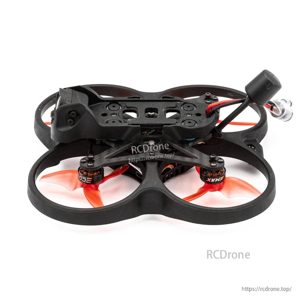 Low rear-side view of ducted quad frame showing motor pods, wiring, and battery lead at the back