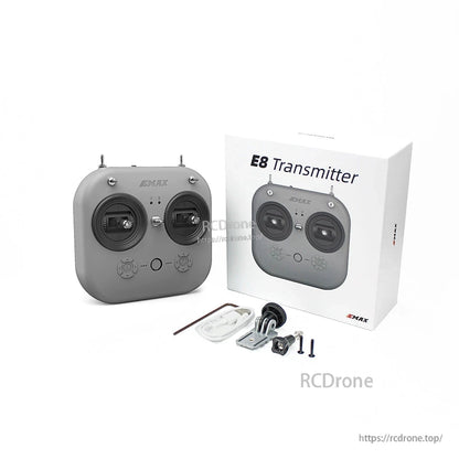 EMAX E8 transmitter packaging with included accessories laid out (transmitter view obscured)
