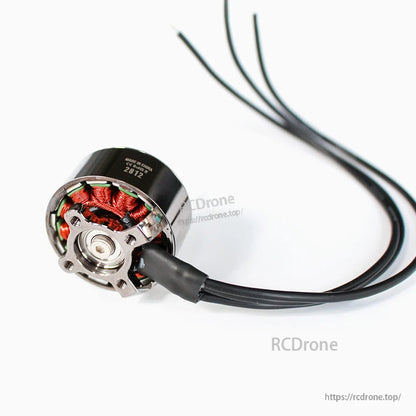 Rear view of brushless motor showing base mount plate, bearing, and wire exit