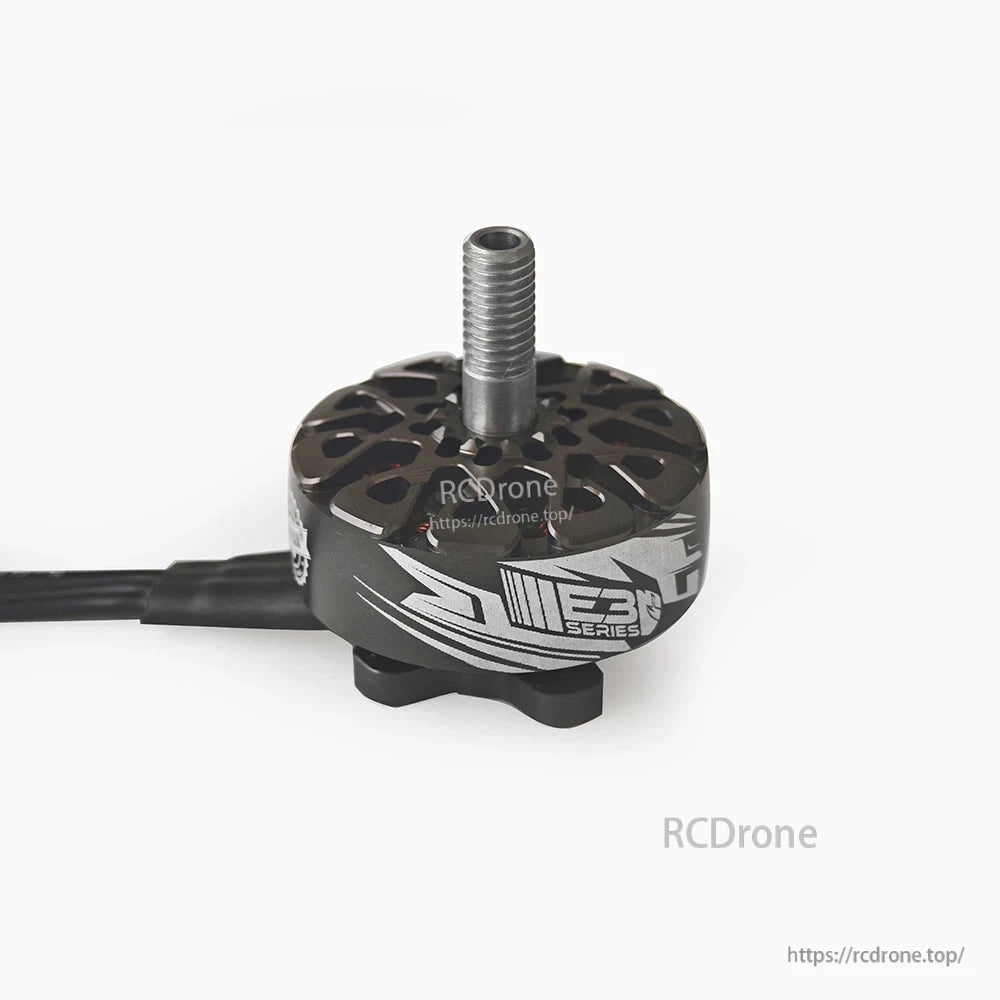 Low side angle of motor showing ECO series graphics, base mount feet, and attached lead wire