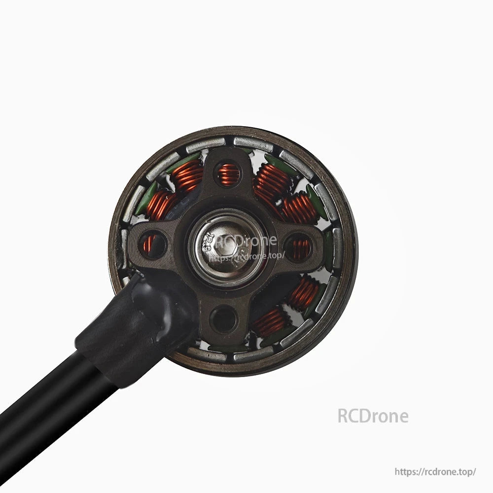 Bottom view of motor showing base plate, mounting pattern, and internal copper windings