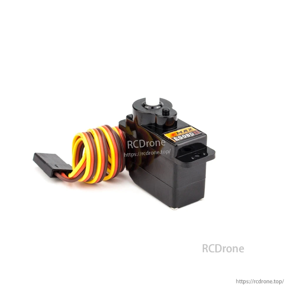 Angled rear view of mini servo showing coiled cable and 3-pin connector plug beside mounting ear