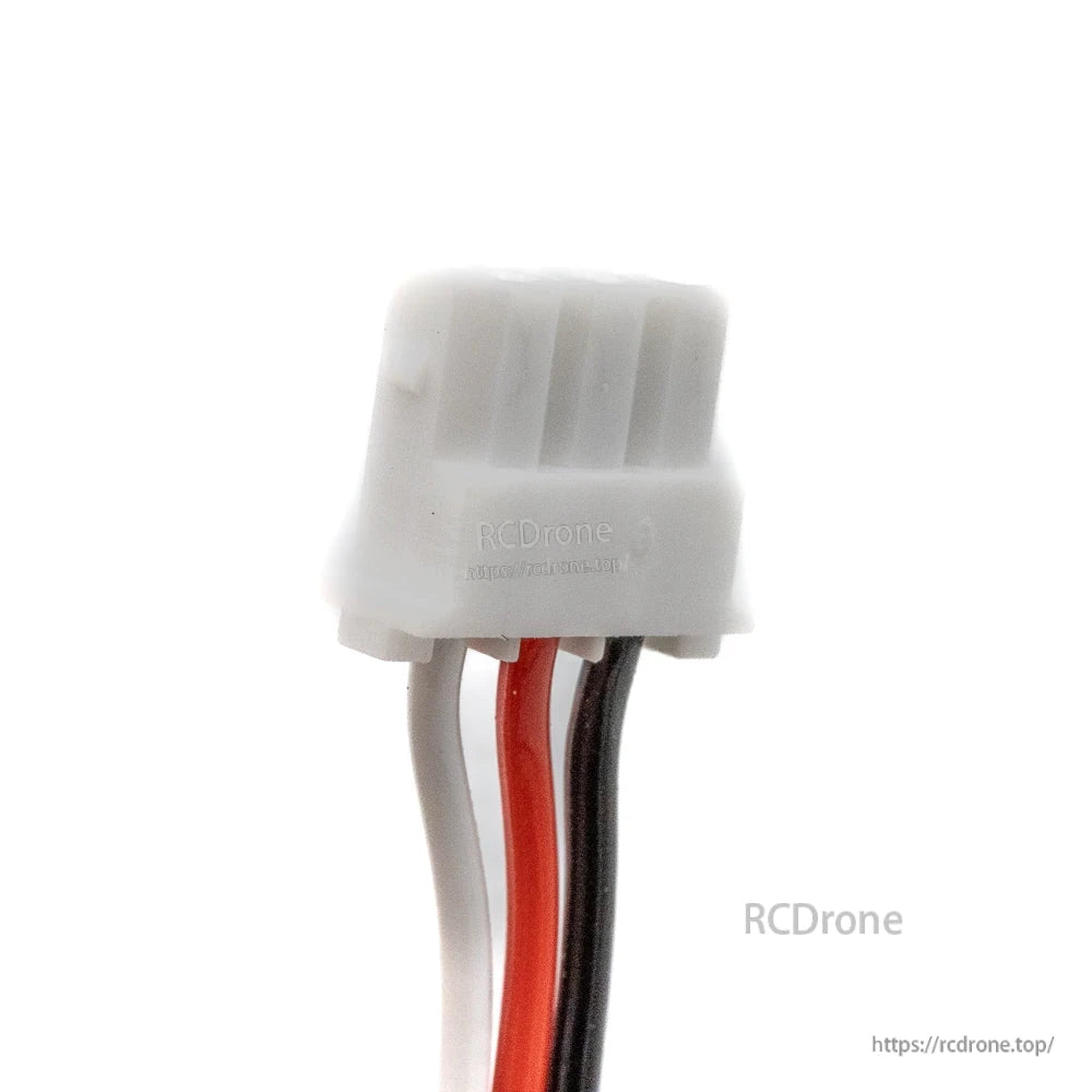 Close-up of white 3-pin connector on red, black, and white servo lead wires