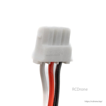 Close-up of white 3-pin connector on red, black, and white servo lead wires