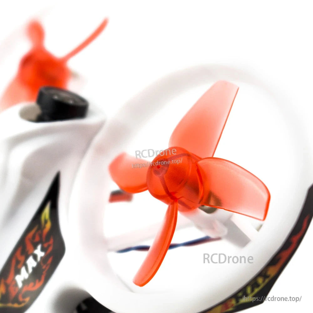 Close-up of orange tri-blade propeller inside white duct guard on the micro quad