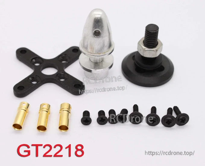 Close-up of mounting accessories: prop adapter, cross mount plate, bullet connectors, and screw set