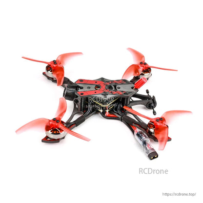 Angled rear-right view of quadcopter showing top plate, wiring, and power connector lead