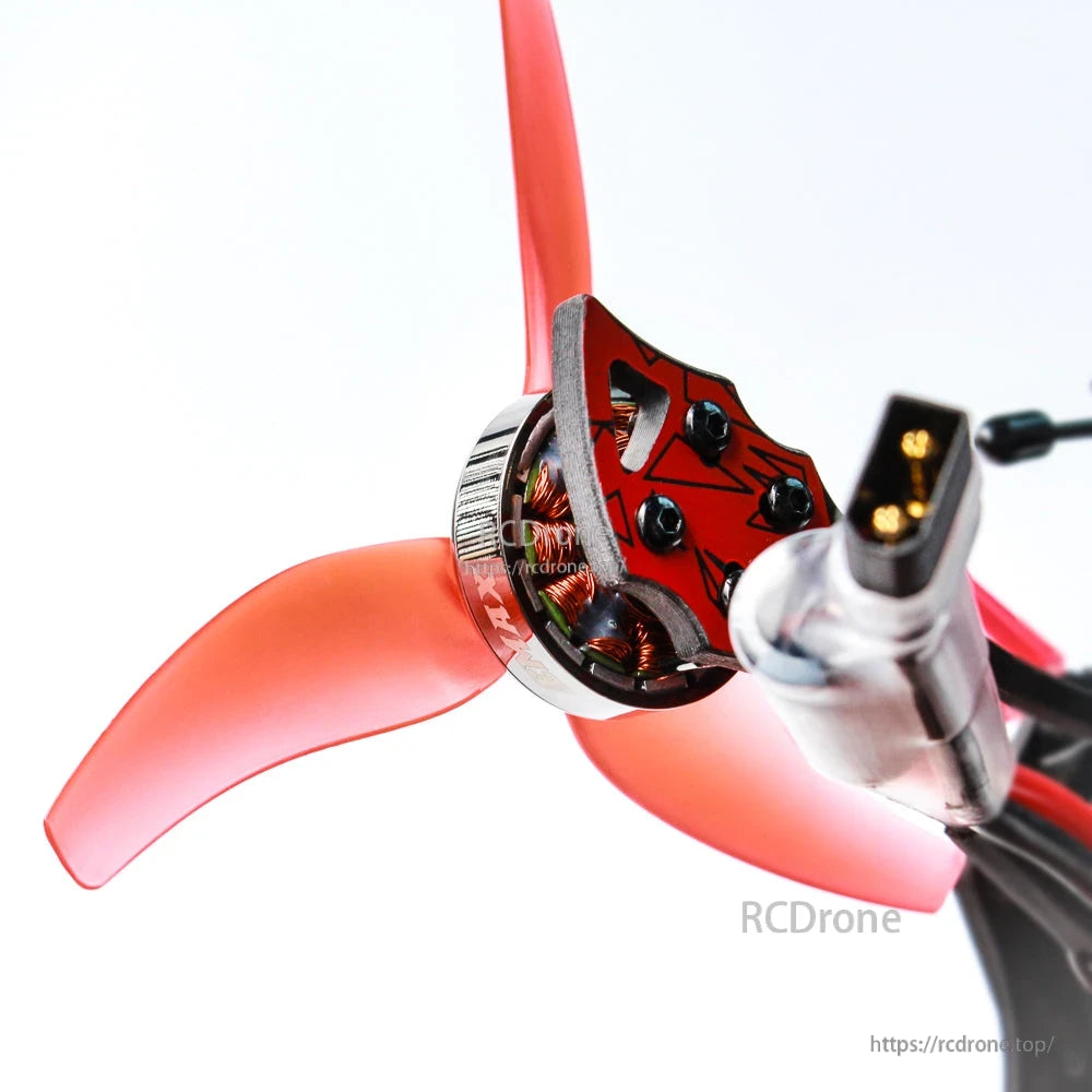 Close-up of brushless motor, propeller hub, and power lead connector