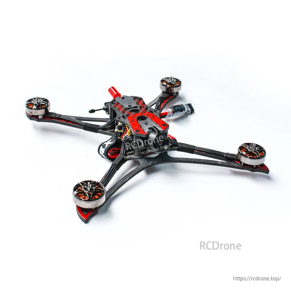 Angled view of quad without propellers highlighting carbon-fiber arms, motors, and top plate
