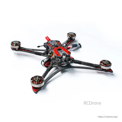 Angled view of quad without propellers highlighting carbon-fiber arms, motors, and top plate