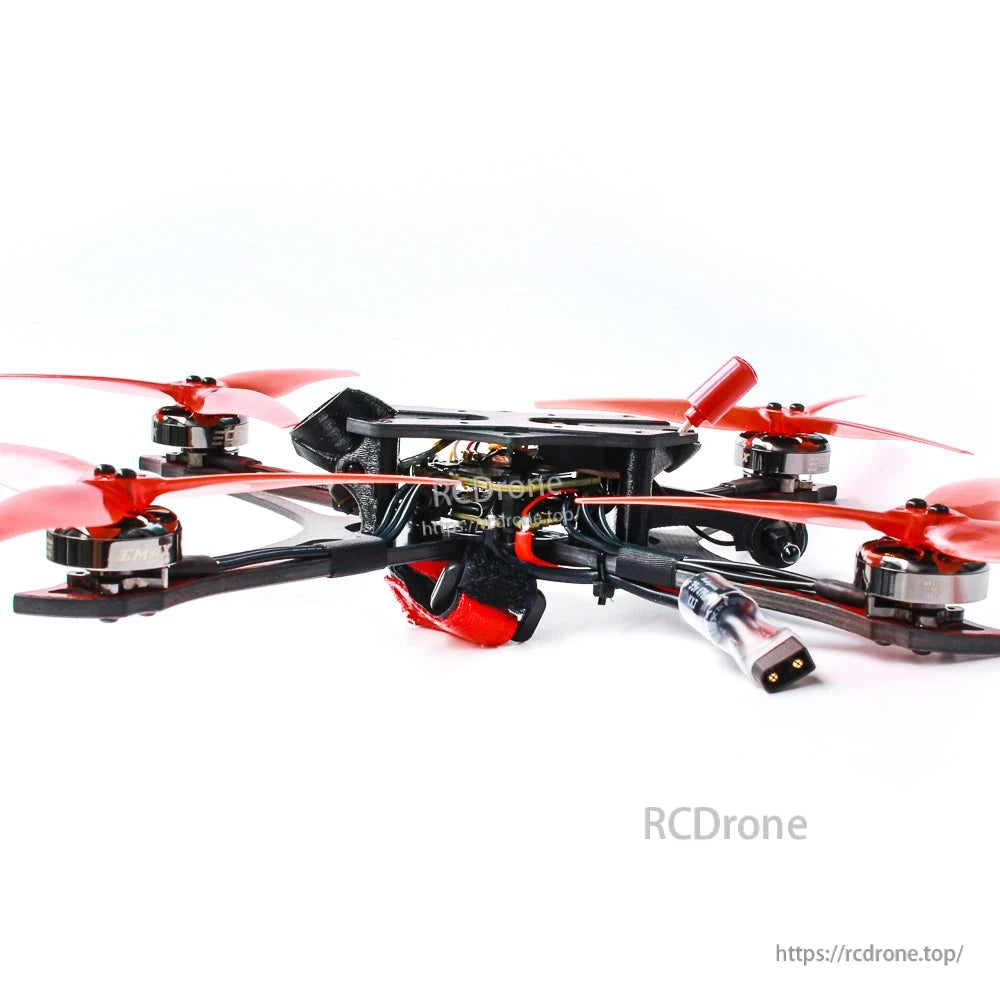 Low side profile showing carbon frame height, motor mounts, and battery connector lead