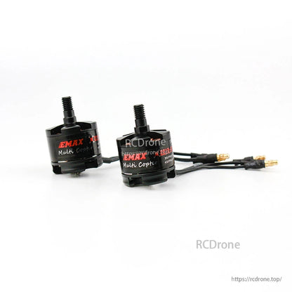 Two EMAX MT2213 series brushless motors shown together for size comparison, one with wires attached