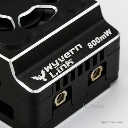 Wyvern Link 800mW VTX close-up showing Wyvern Link logo and side mounting threads on housing