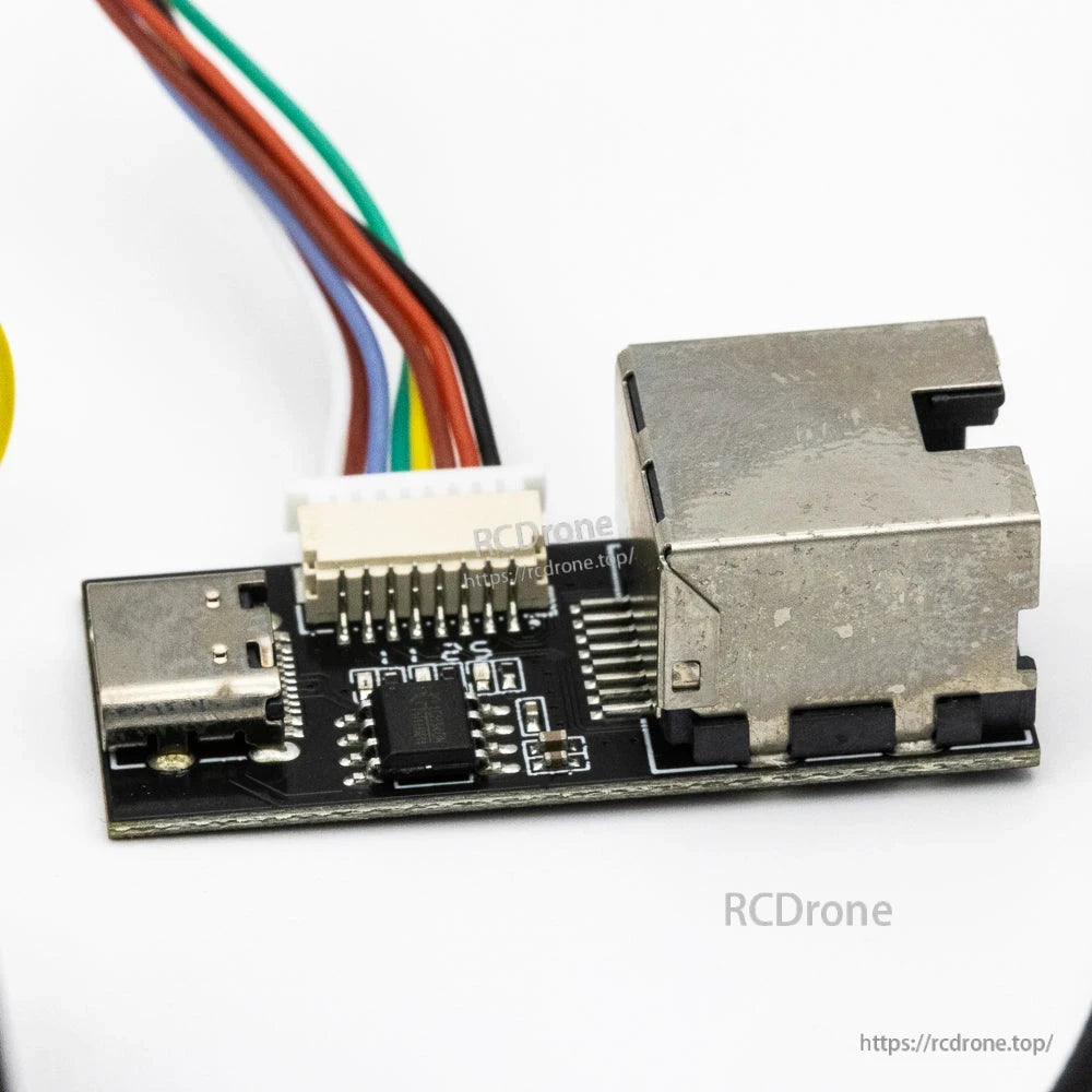 Interface board close-up with USB-C port, Ethernet-style jack, and wired connector header