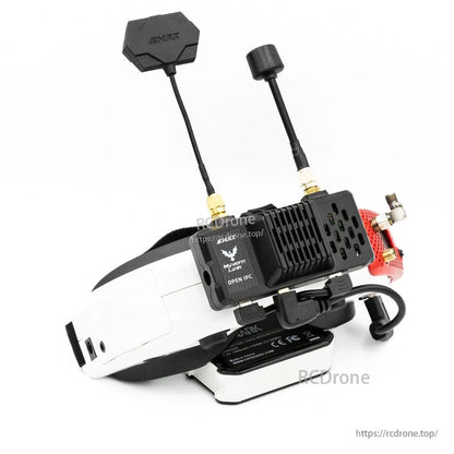 Wyvern Link VRX mounted on FPV goggles strap bracket, showing installed antennas and side profile