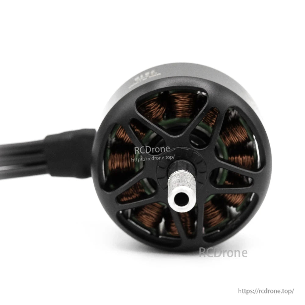 Top view of brushless outrunner motor showing vented bell and copper windings