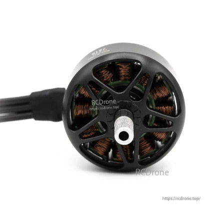 Top view of brushless outrunner motor showing vented bell and copper windings