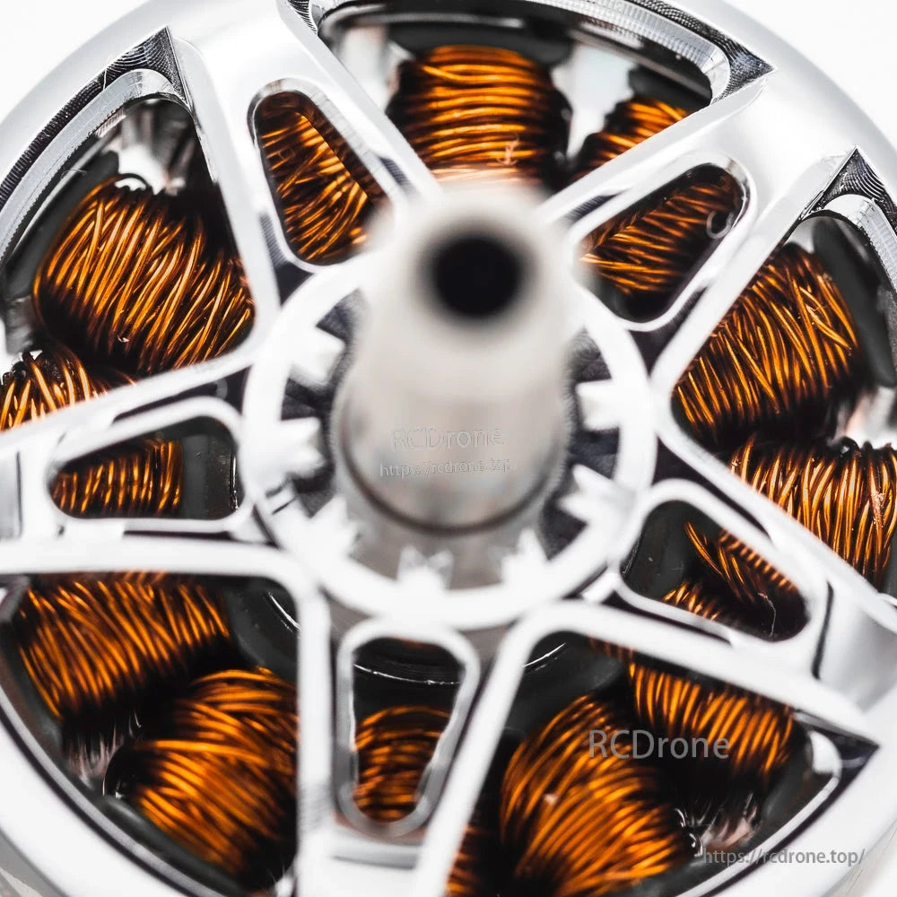 Top-down macro of brushless motor stator windings and bell spoke design around center shaft
