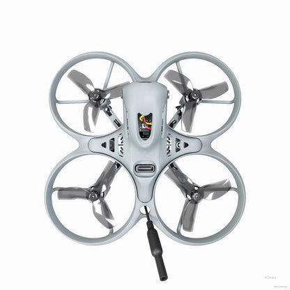 Top-down view of EMAX Tinyhawk Lite RTF FPV micro quad showing frame, props, and antenna