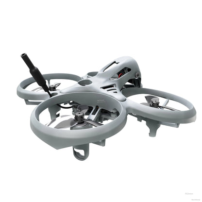 Angled side view of ducted micro quadcopter showing canopy, motor mounts, and antenna