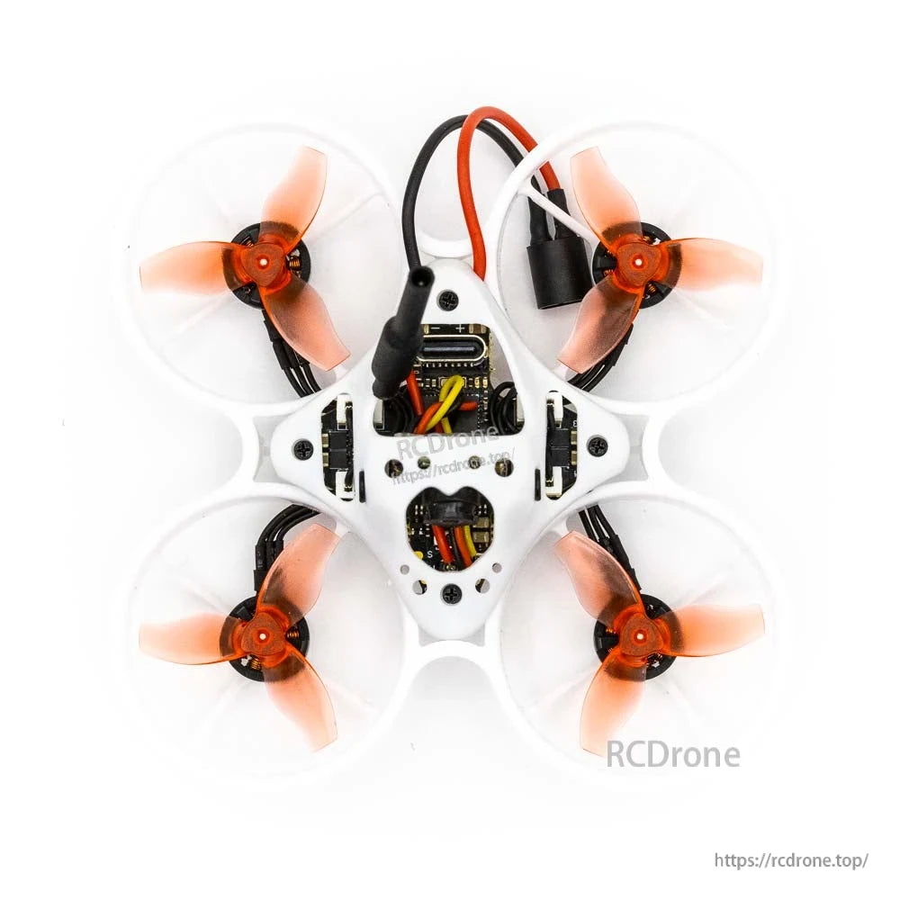 EMAX Tinyhawk Nanoscout 65mm FPV top view showing four ducted rotors, canopy, and wiring
