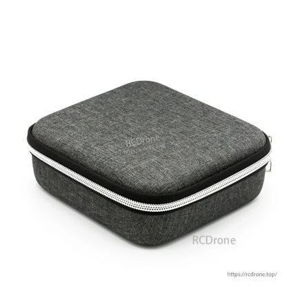 Gray zippered hard carrying case closed, exterior view