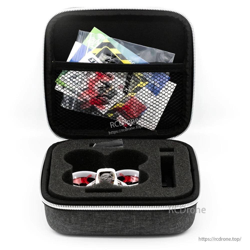 Zippered carry case open with foam insert for the drone and mesh pocket with manuals/accessories