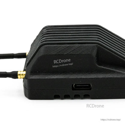 EMAX Wyvern Link OpenIPC FPV VRX side profile with ribbed housing and USB-C port