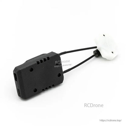 Rear angle of receiver body showing mounting holes, vents, and attached antenna cables