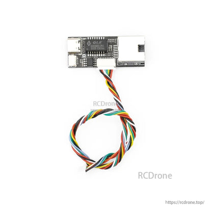 Top-down view of USB‑C to RJ45-style interface board with multicolor cable attached