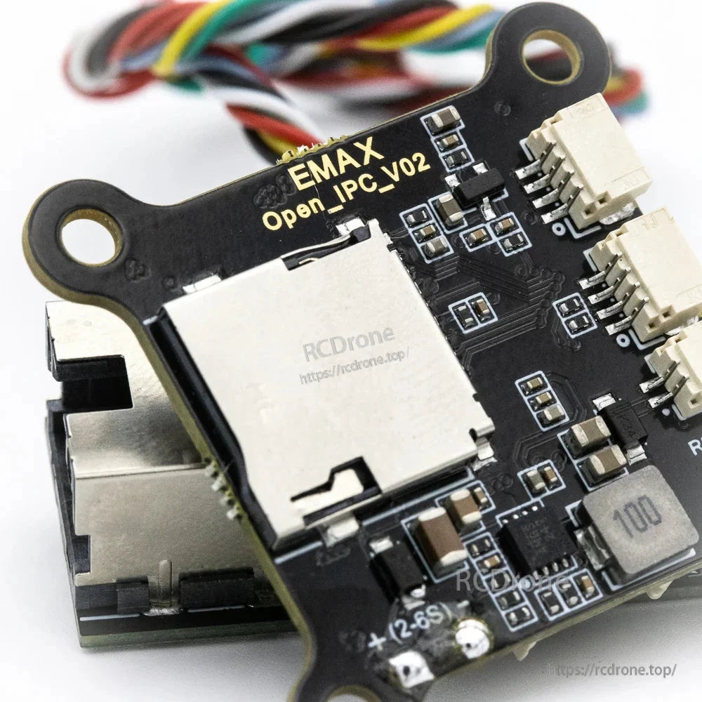 Close-up of EMAX Open_IPC_V02 text and microSD card slot area with adjacent connectors