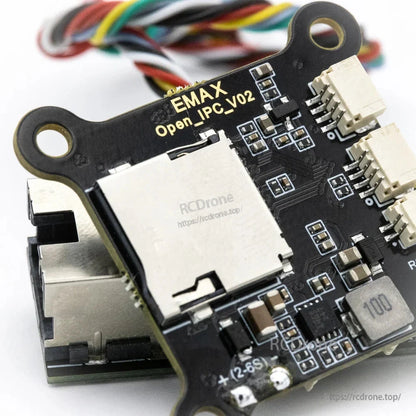Close-up of EMAX Open_IPC_V02 text and microSD card slot area with adjacent connectors