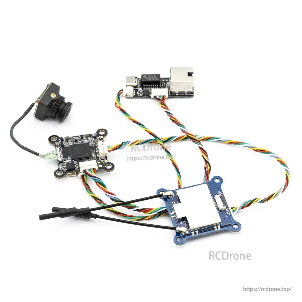 OpenIPC FPV VTX system components connected together, showing camera, main board, and antenna module