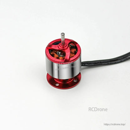 EMax CF2215 2200KV brushless motor angled top view showing rotor cutouts and copper windings