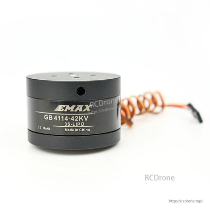 EMAX GB4114-42KV motor side view with coiled lead trailing behind, wide composition