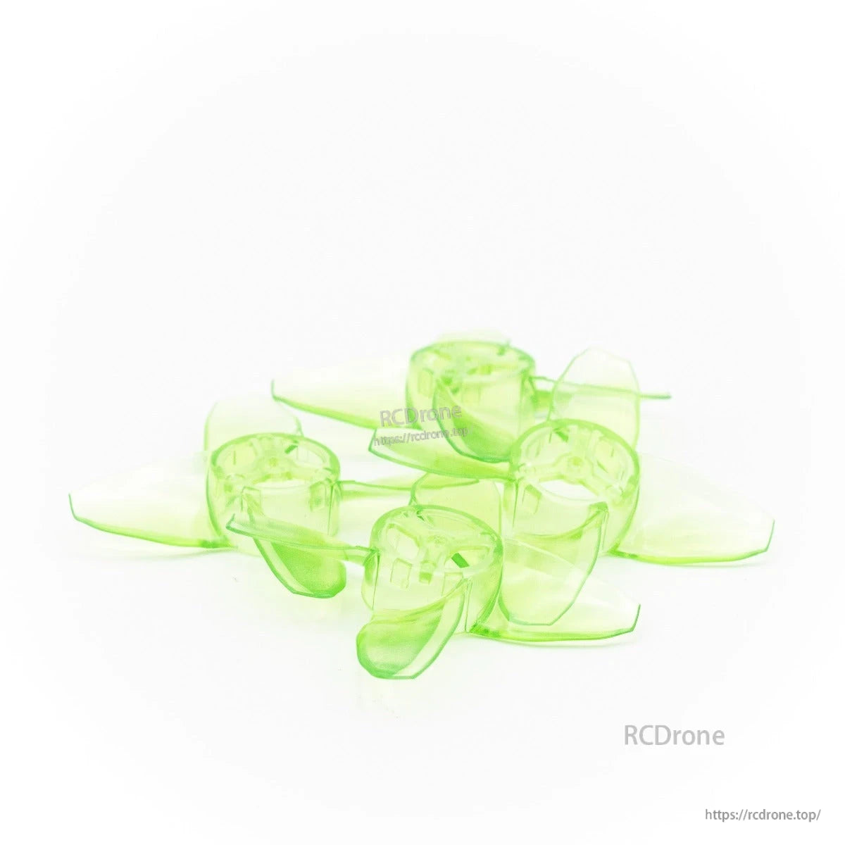 Stacked translucent green propeller set, four 4-blade micro props on white background
