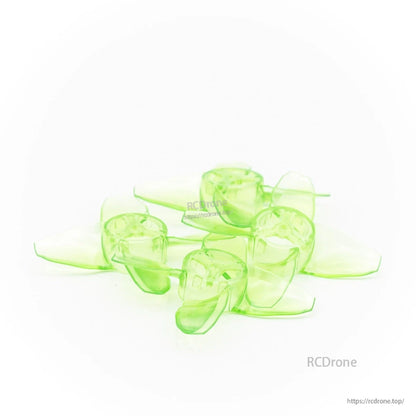 Stacked translucent green propeller set, four 4-blade micro props on white background
