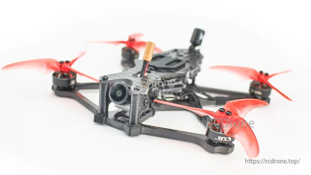 Side view of the EMAX Babyhawk II HD micro quad showing 3.5-inch props, camera cage, and antenna mount